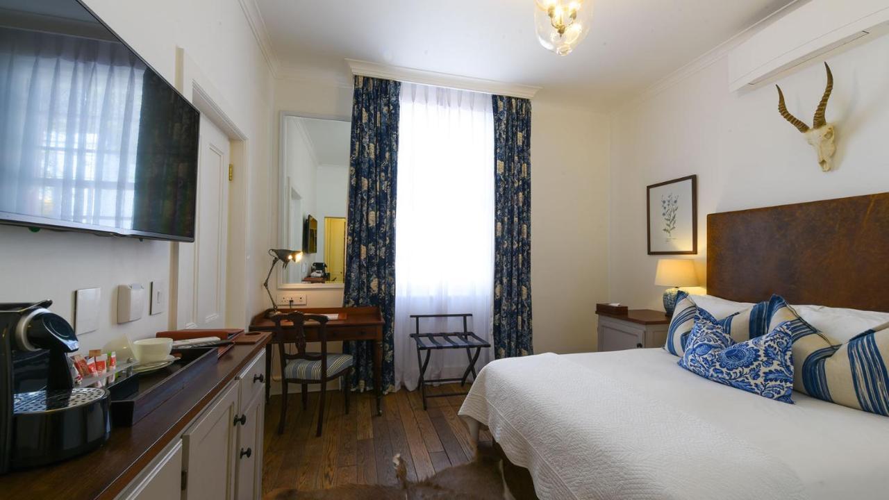 Drostdy Hotel Graaff Reinet Exterior photo A room at the hotel