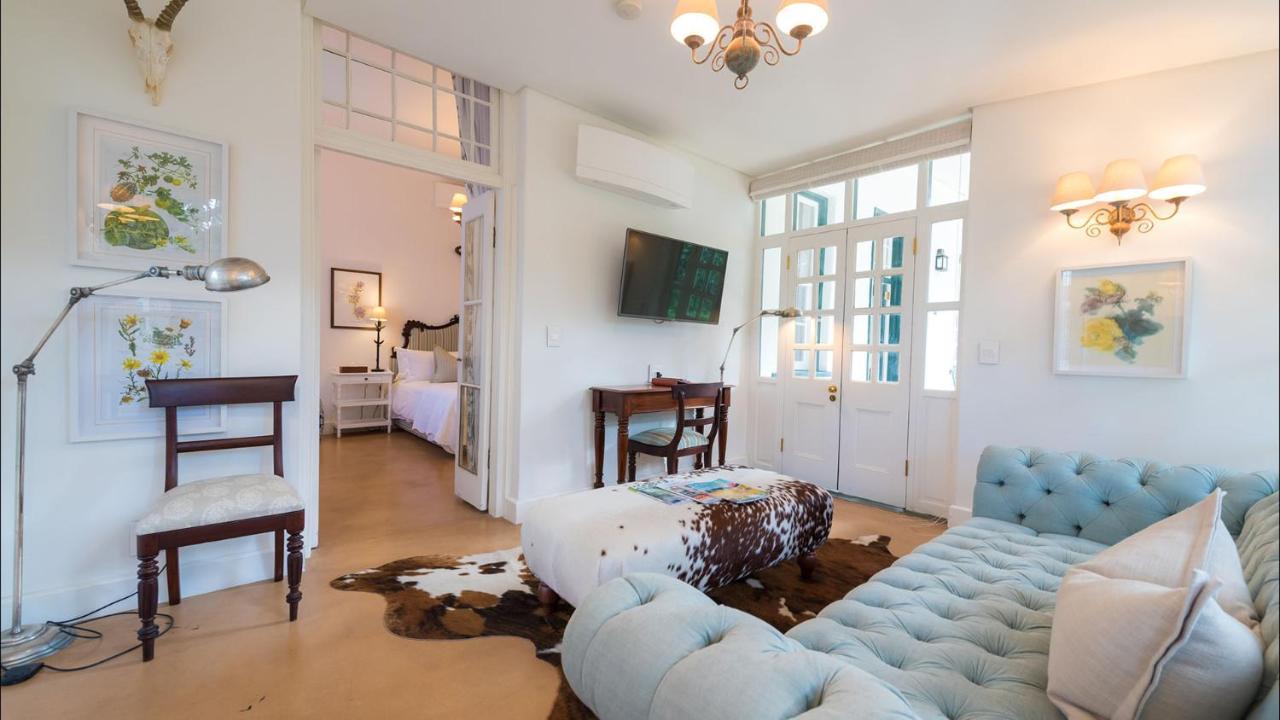 Drostdy Hotel Graaff Reinet Exterior photo A living room in a typical apartment