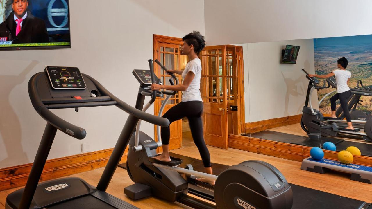 Drostdy Hotel Graaff Reinet Exterior photo A woman using a cross trainer