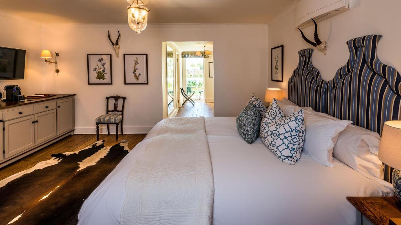 Drostdy Hotel Graaff Reinet Exterior photo A bedroom at the Oyster Box