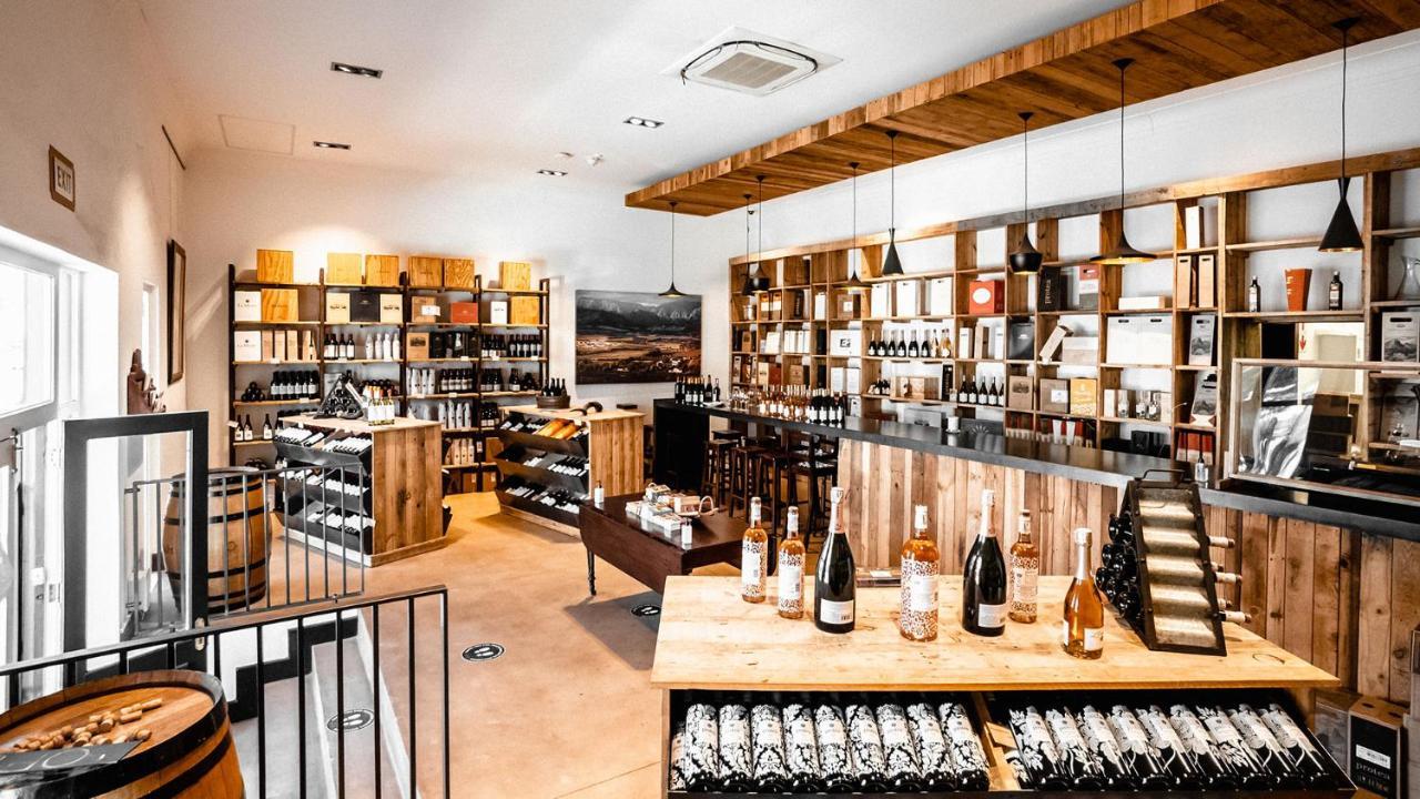 Drostdy Hotel Graaff Reinet Exterior photo The interior of a wine shop in Germany