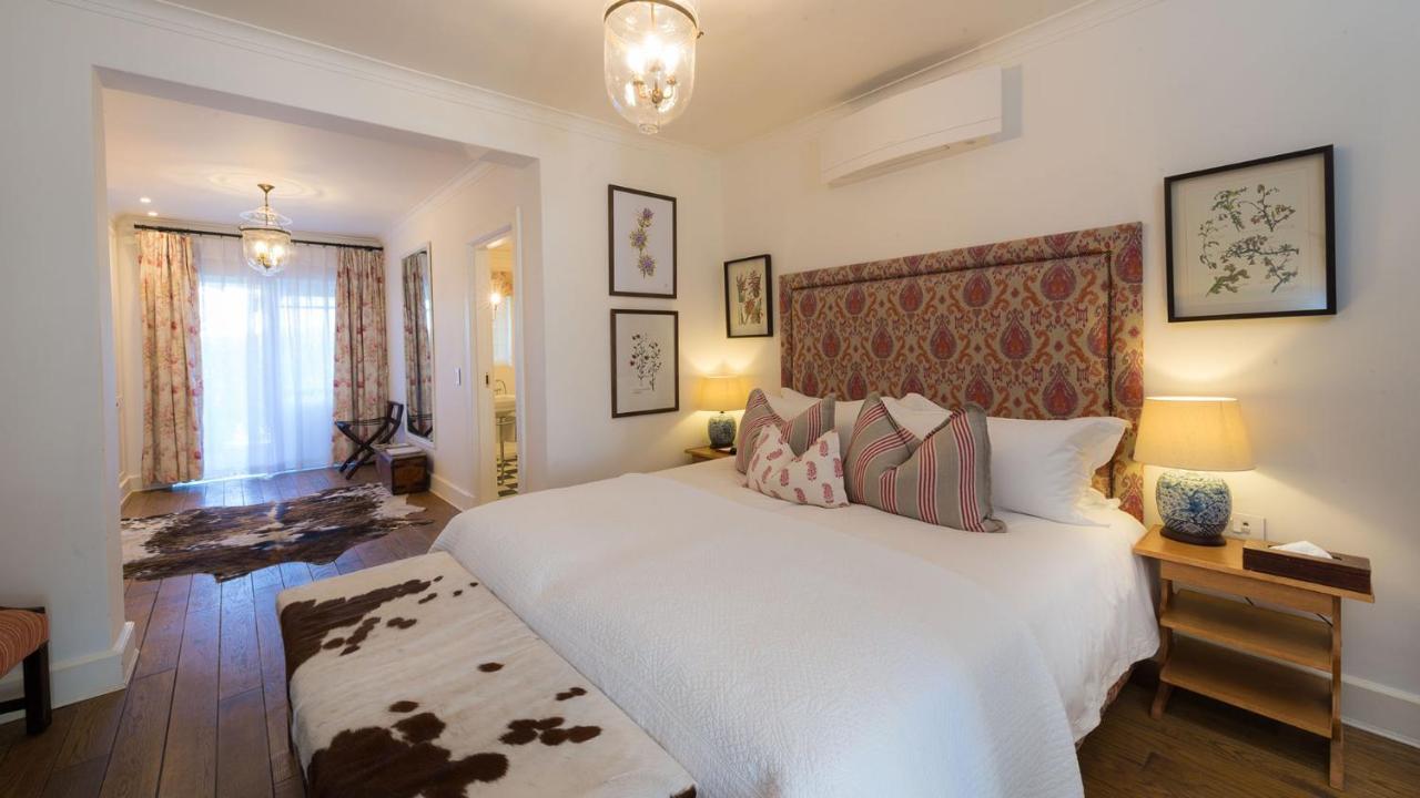 Drostdy Hotel Graaff Reinet Exterior photo A bedroom at the Cape Heritage