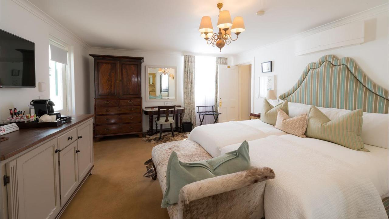 Drostdy Hotel Graaff Reinet Exterior photo A room at the hotel